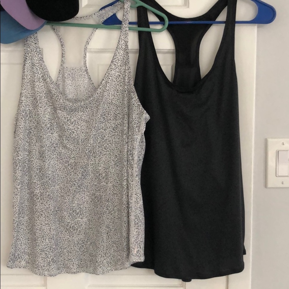 2 Lucy tanks, size medium I believe